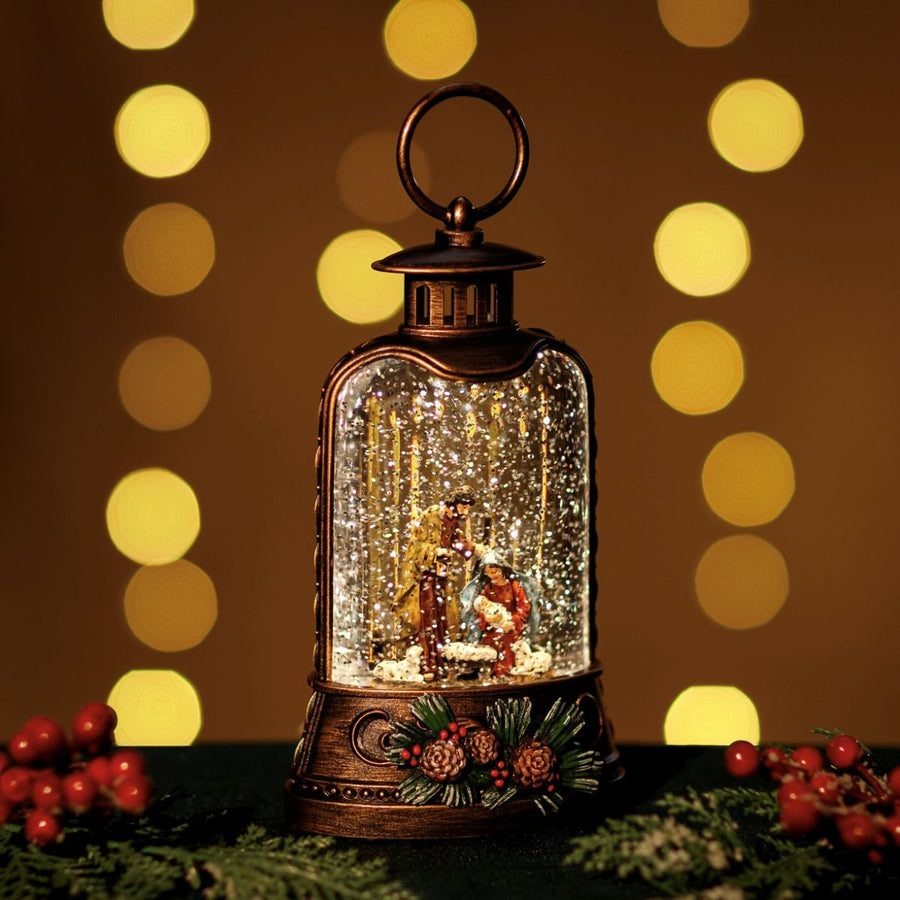 Decorative lantern with a Christmas scene inside, surrounded by festive decorations and lights.