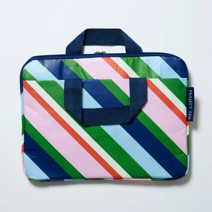 Multicolored striped laptop bag with a handle on a light gray background