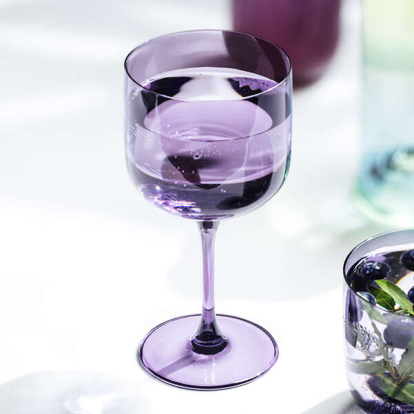 Purple wine glass with a blurred background