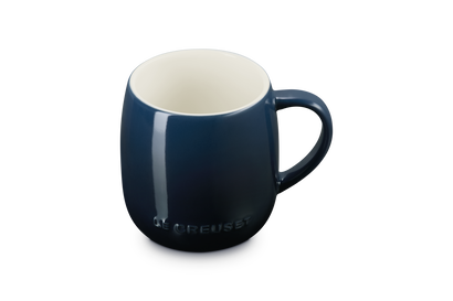 Blue mug with white interior on a white background