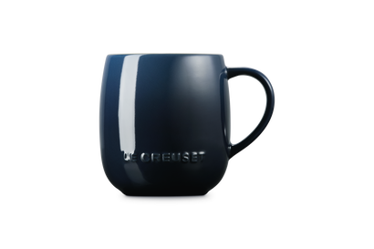 Navy blue mug with a white stripe on a white background