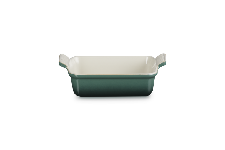 Rectangular green baking dish on a white background