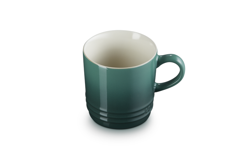 Green mug on a white background