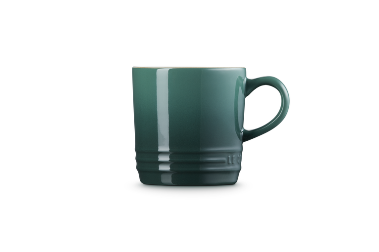 Green mug on a white background