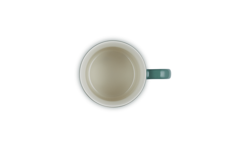 Green mug on a white background