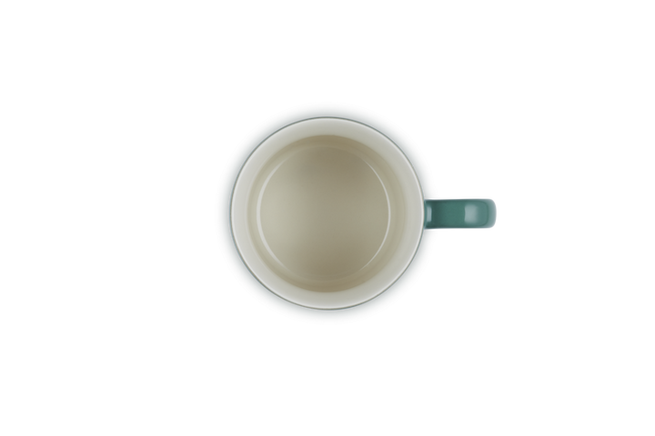 Green mug on a white background