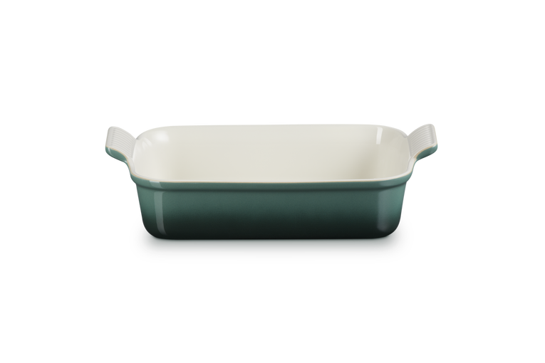 Rectangular baking dish with handles in green on a white background