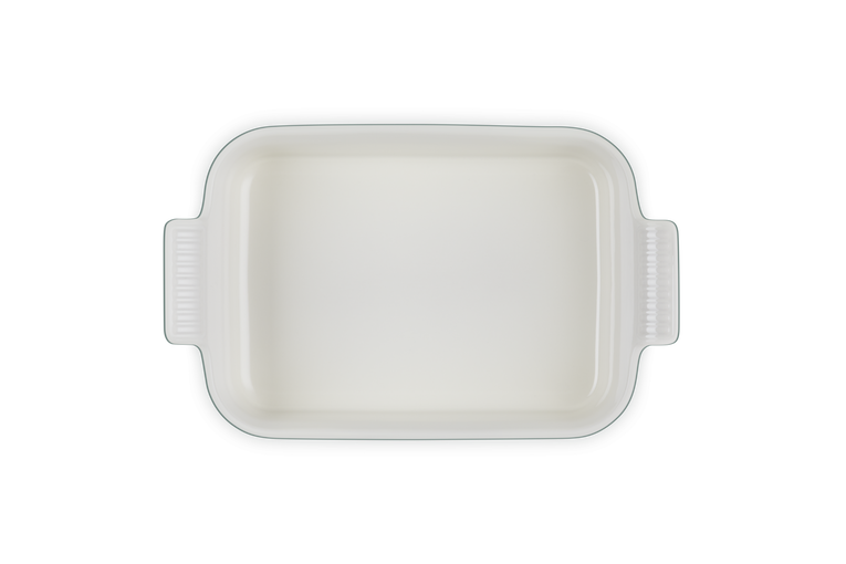Rectangular white ceramic baking dish on a white background