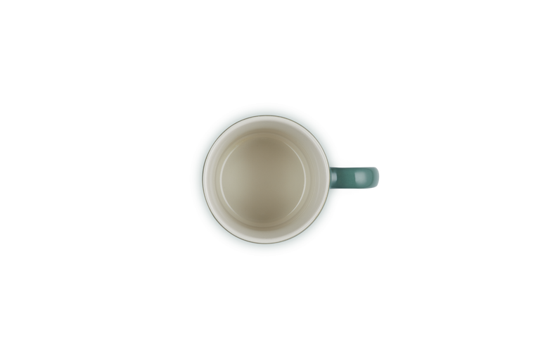 Green mug on a white background