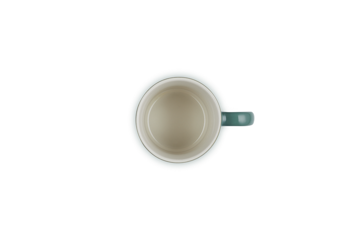 Green mug on a white background
