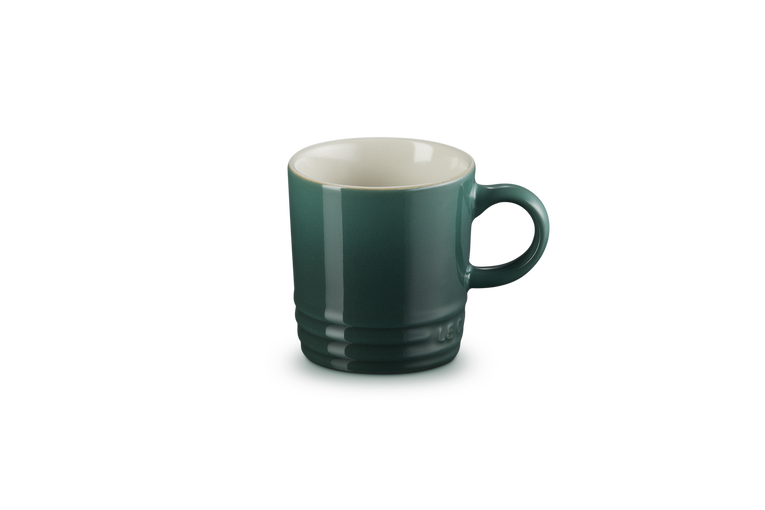 Green mug on a white background