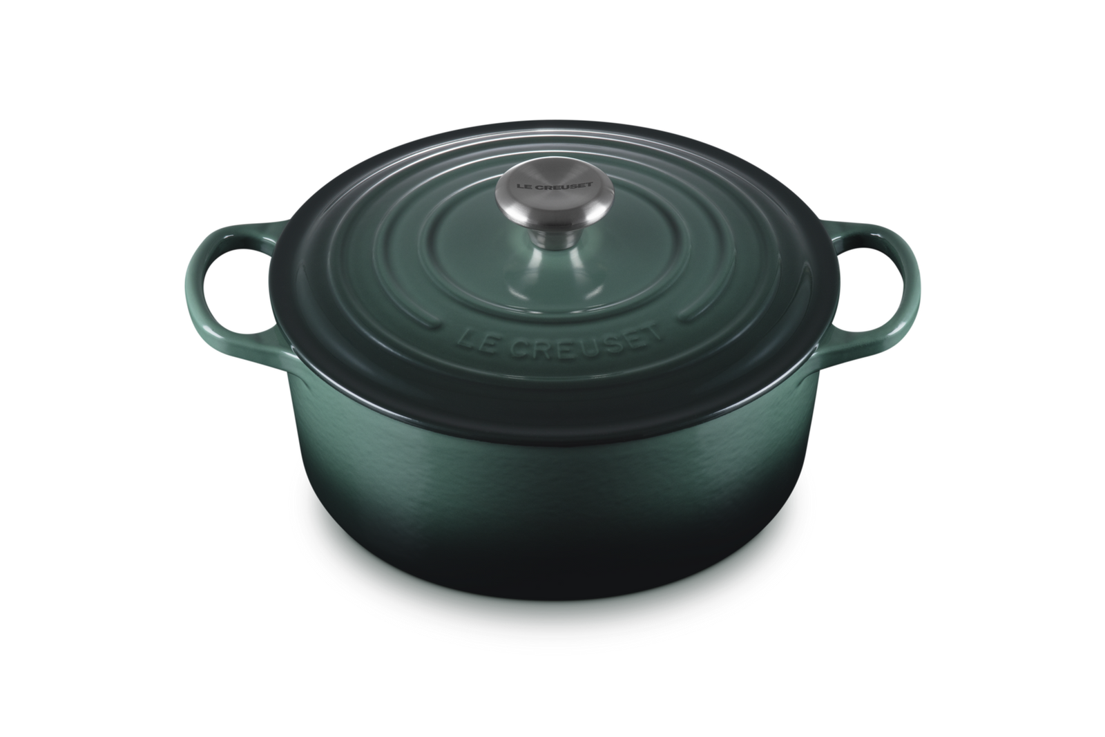 Green cast iron cookware pot with lid on a white background