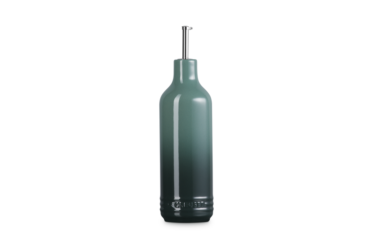 Dark green olive oil bottle on a white background
