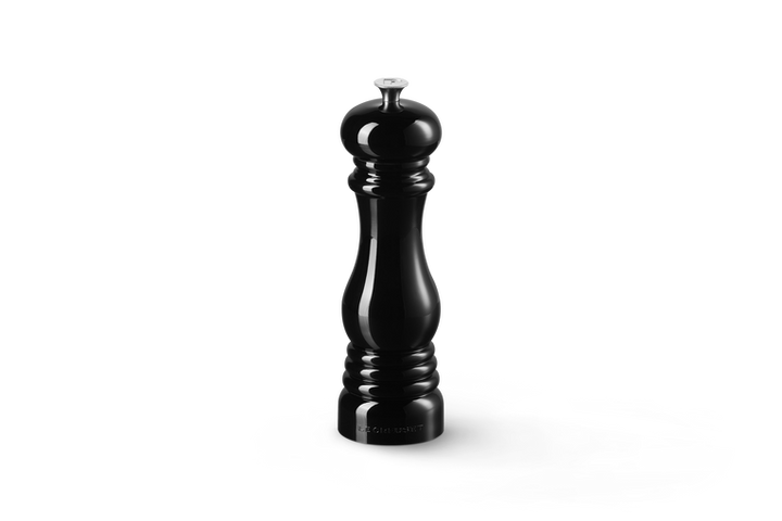 Black pepper grinder on a white background
