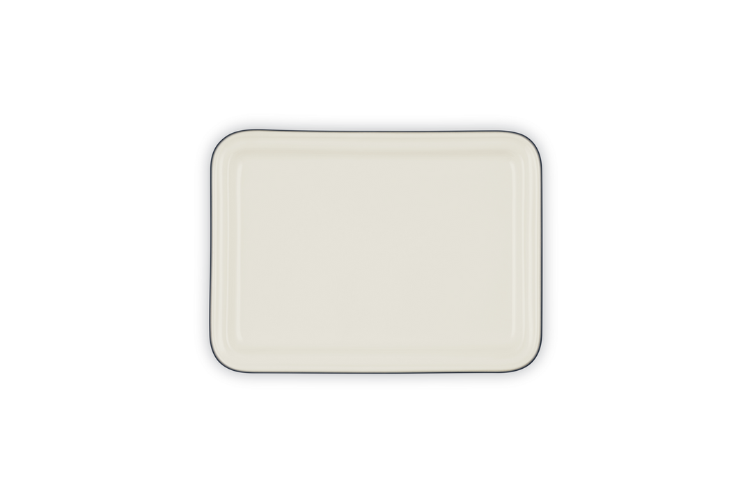 Rectangular ceramic plate with a subtle pattern on a white background