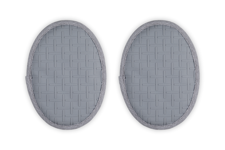Two gray silicone pot holders on a white background