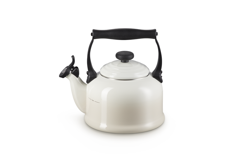 White teapot with black handles on a white background