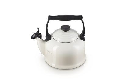 White kettle with black handle on a white background