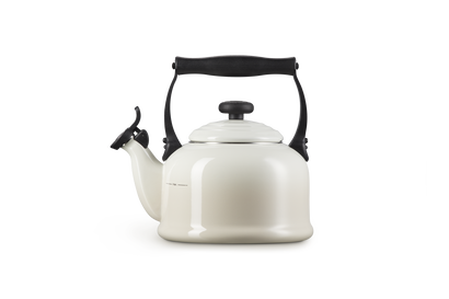 White kettle with black handle on a white background