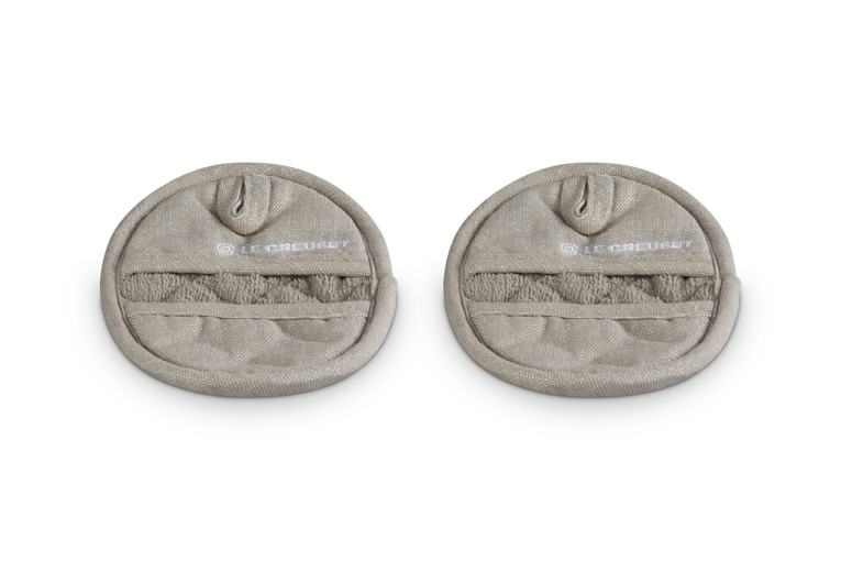 Two beige pot holders with brand logo on a white background