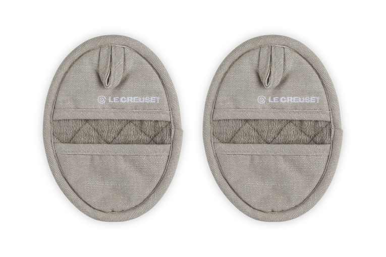 Two beige pot holders with &