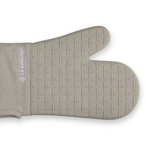 Gray oven mitt with textured surface on a white background