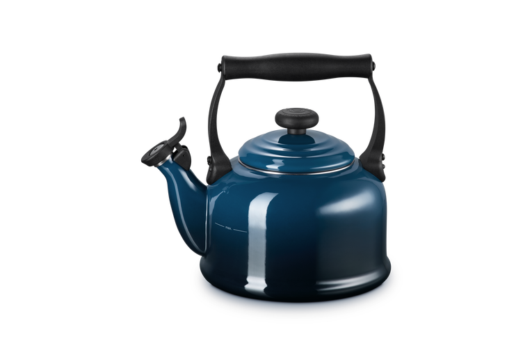 Blue kettle with black handle and spout on a white background