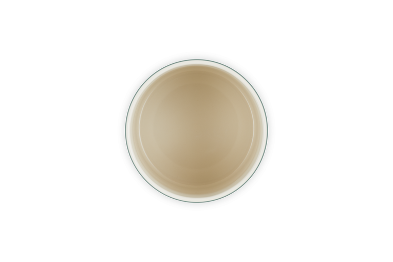 Inside of an utensil holder on a white background