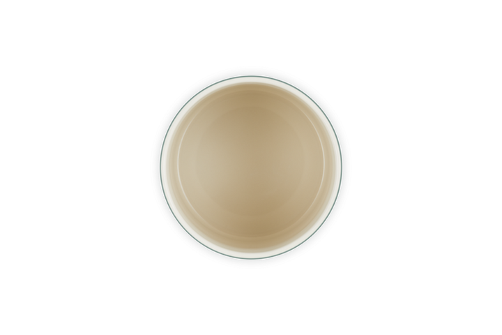 Inside of an utensil holder on a white background