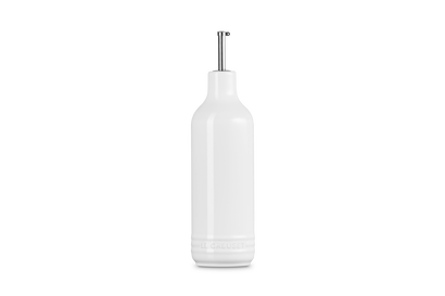 White ceramic oil bottle with a silver cap on a white background