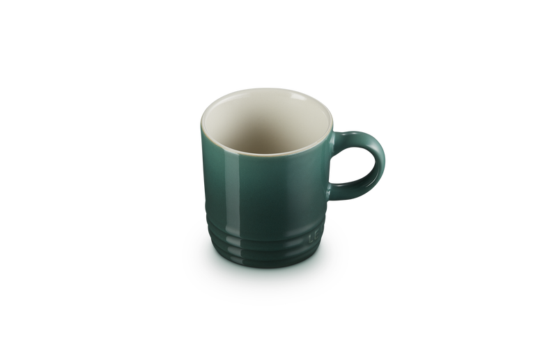 Green mug on a white background