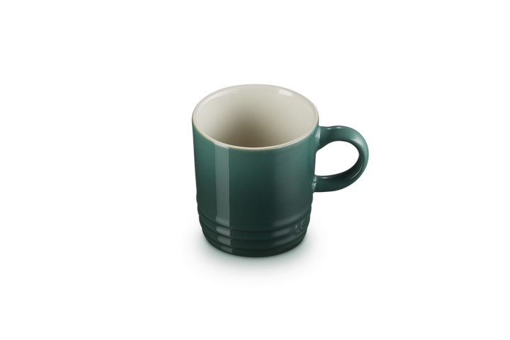 Green mug on a white background