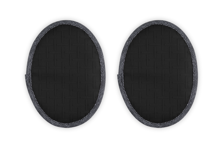 Two black oval-shaped pot holders on a white background