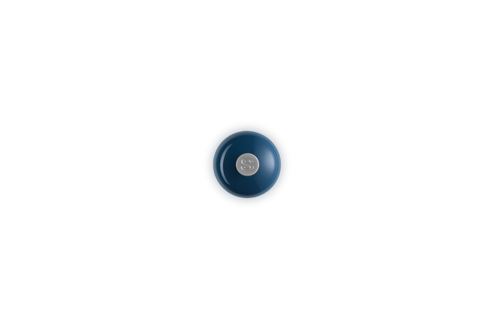 Blue salt grinder with a logo on a white background