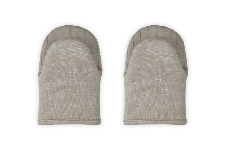 Pair of gray oven mitts on a white background