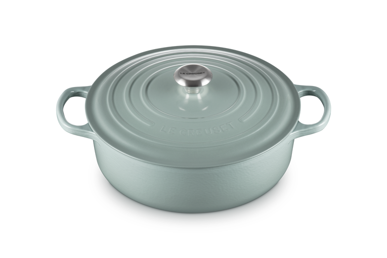 Light blue risotto pot on a white background
