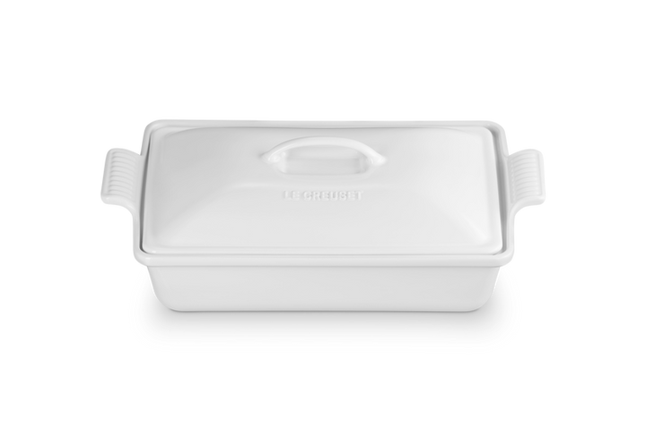 White ceramic baking dish with lid on a white background