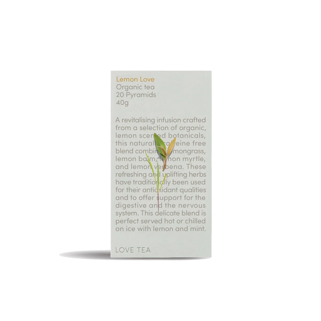Box of Lemon Love Organic Tea with text and a small plant on a white background