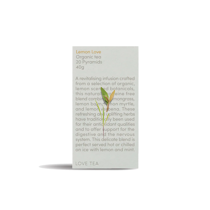 Box of Lemon Love Organic Tea with text and a small plant on a white background