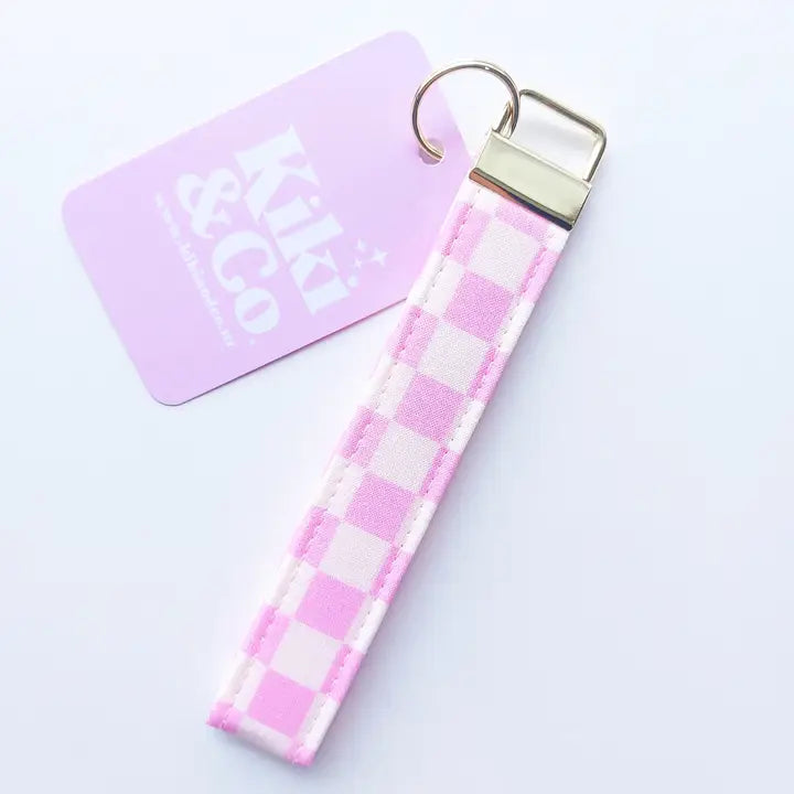 Purple & white checkerboard keychain with metal keyring