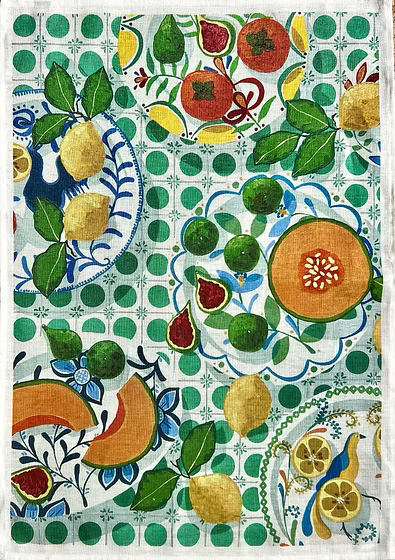 Linen tea towel with rockmelon, lemons and greenery on a green and white background