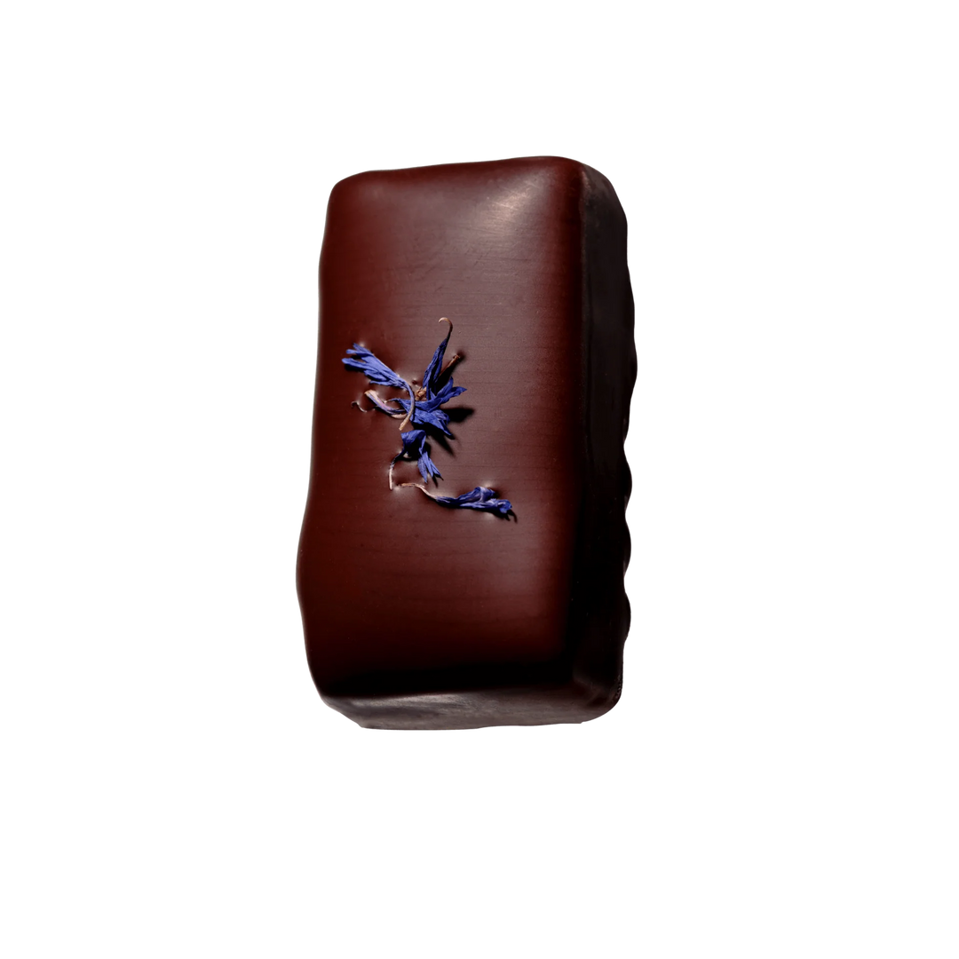 Loco Love chocolate with a cornflowers on top  on a white background