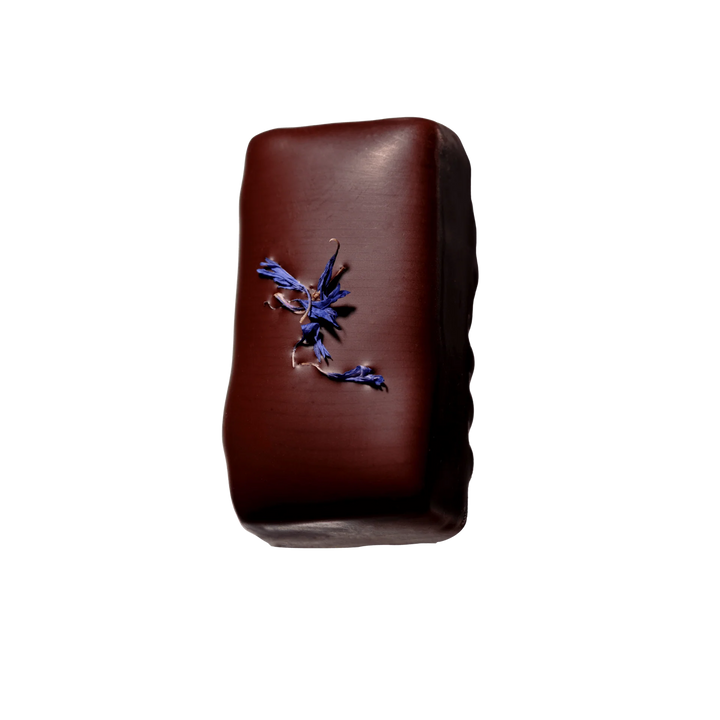 Loco Love chocolate with a cornflowers on top  on a white background