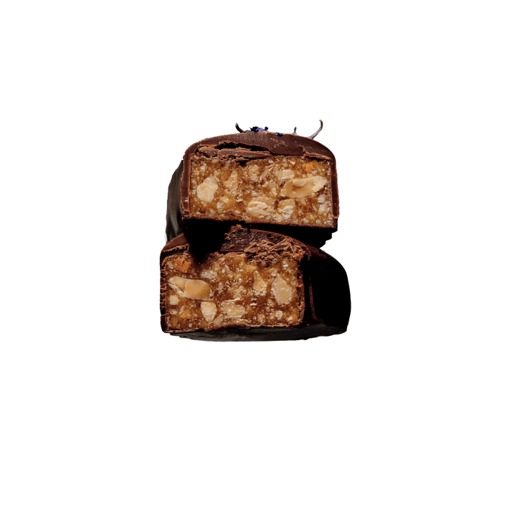 Chocolate bar with almond, caramel filling on a white background