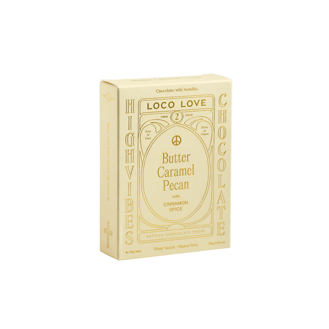 Box of Loco Love Butter Caramel Pecan chocolate on a white background