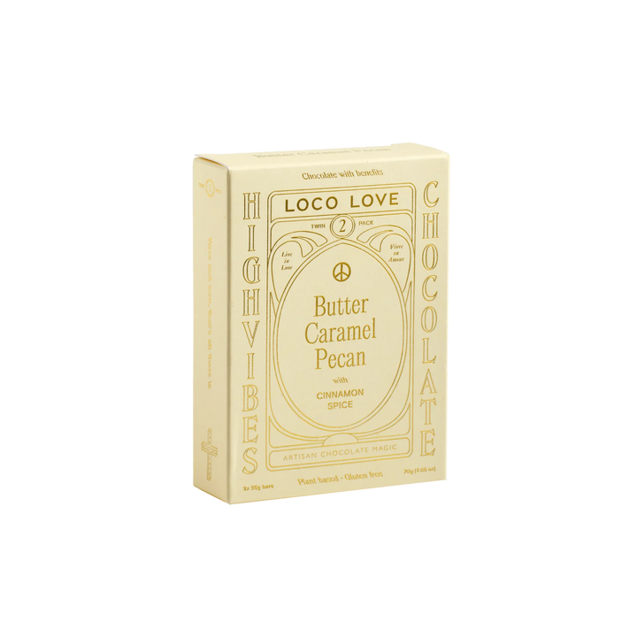 Box of Loco Love Butter Caramel Pecan chocolate on a white background