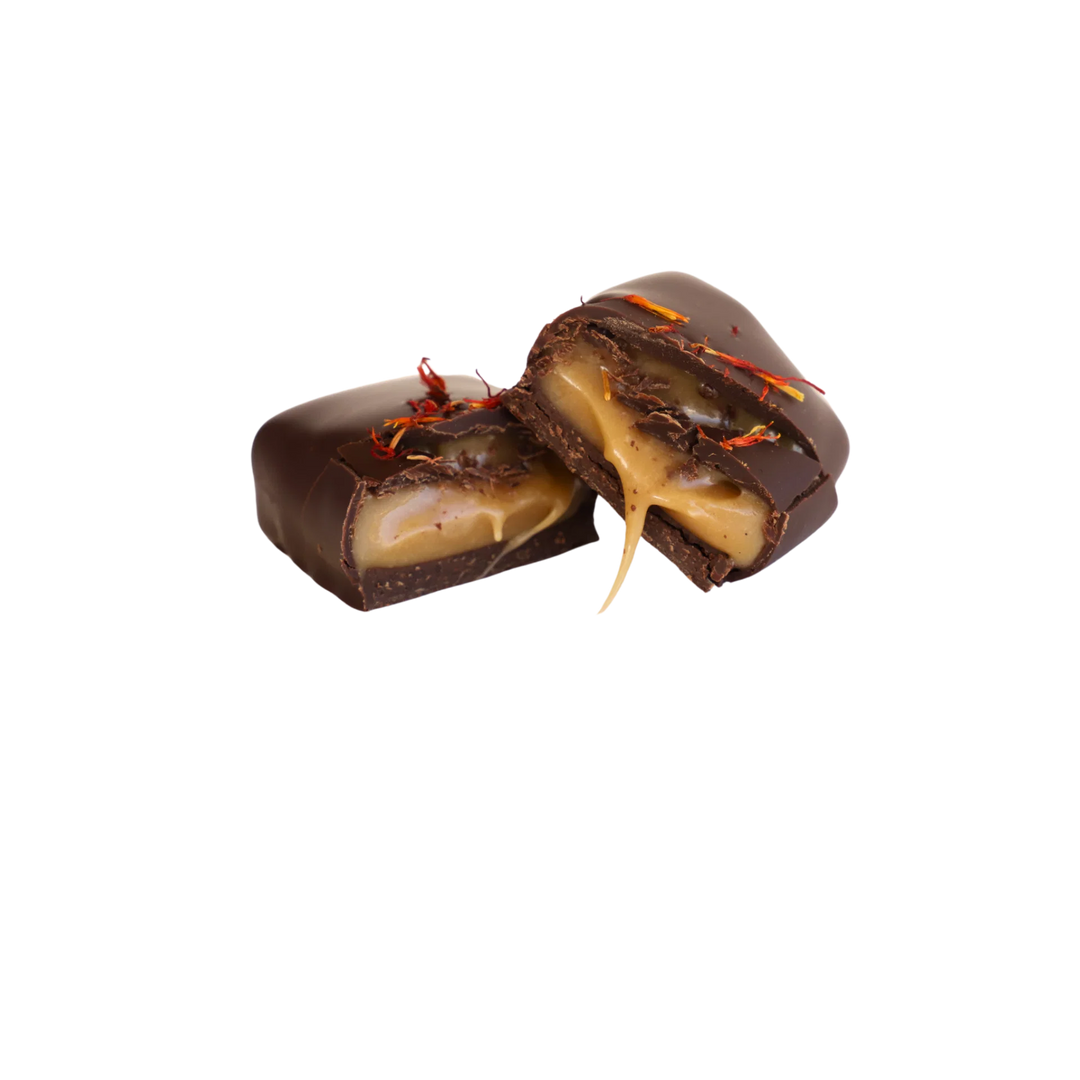Chocolate-covered candy with a white background