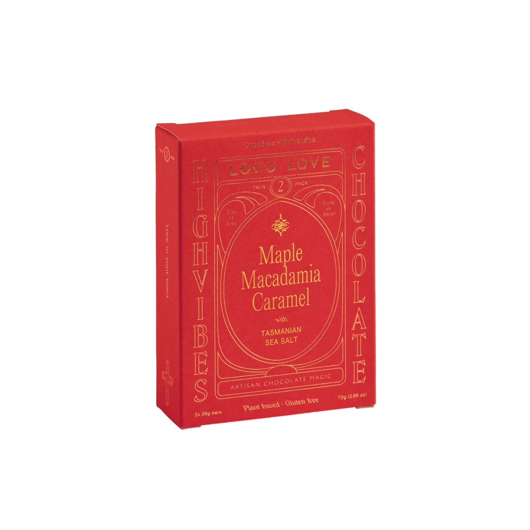 Red box of Maple Macadamia Caramel chocolate on a white background