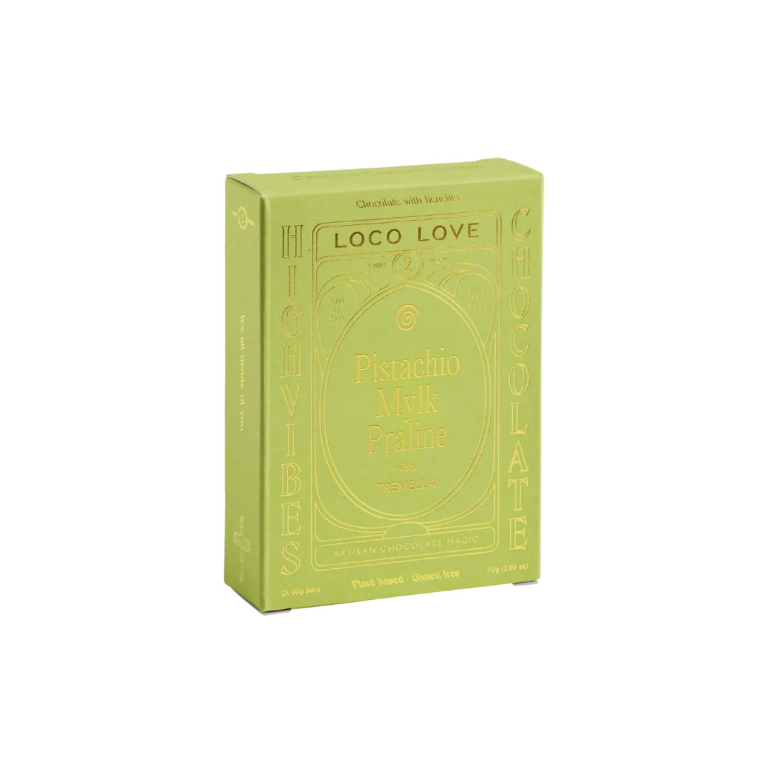 Green packaging of Loco Love Pistachio Milk Praline on a white background