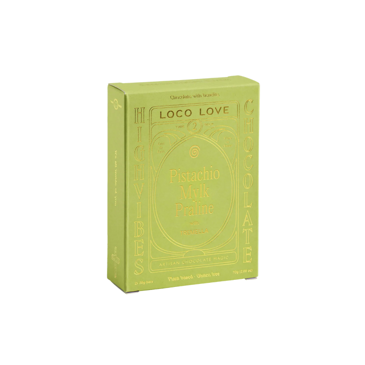 Green packaging of Loco Love Pistachio Milk Praline on a white background